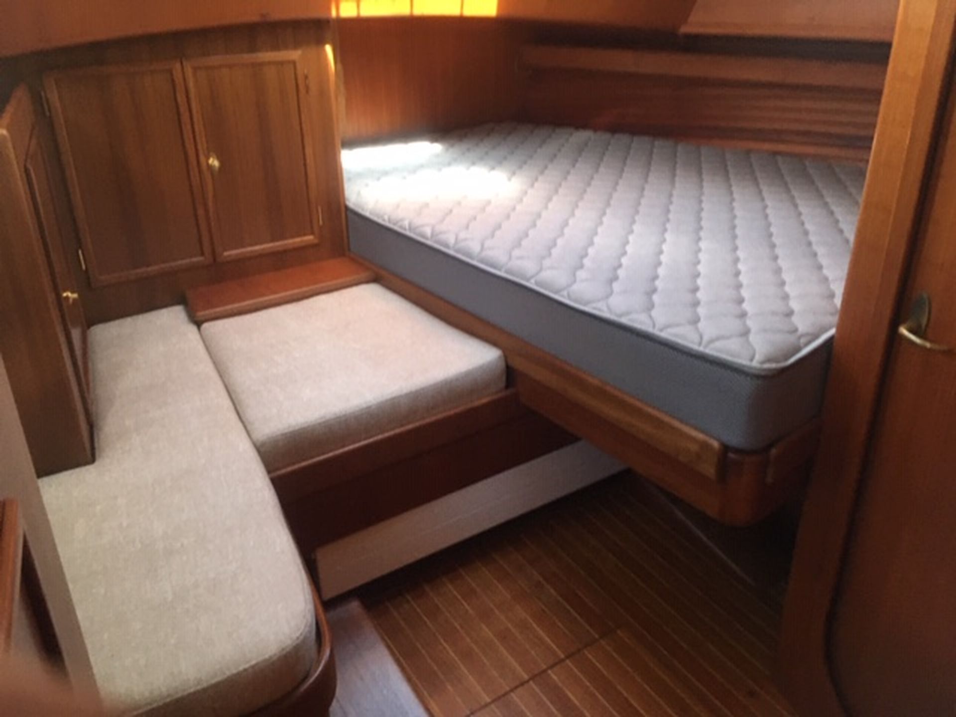 Big double bed in aft cabin (owners Cabin) and lots of storage